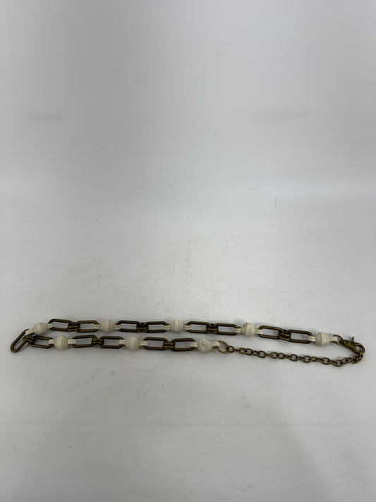 Fossil Chain and White Leather Belt